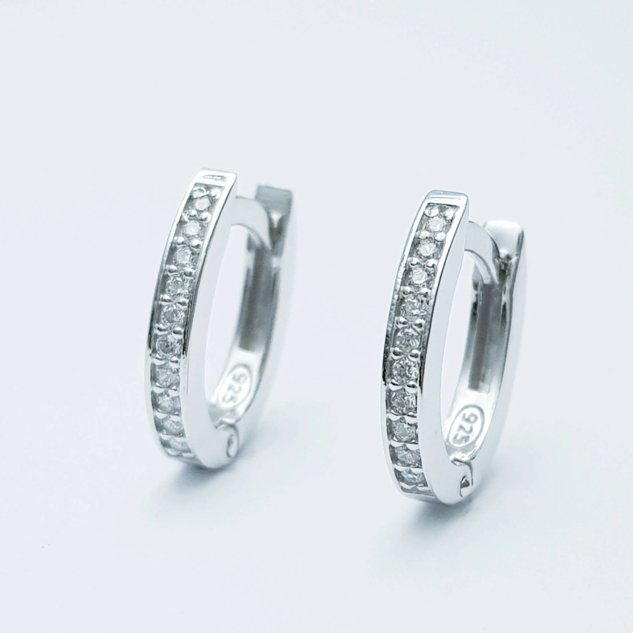 Dainty silver hoop earrings with removable blue heart drop, two earrings in one, faux sapphire minimal huggie earrings